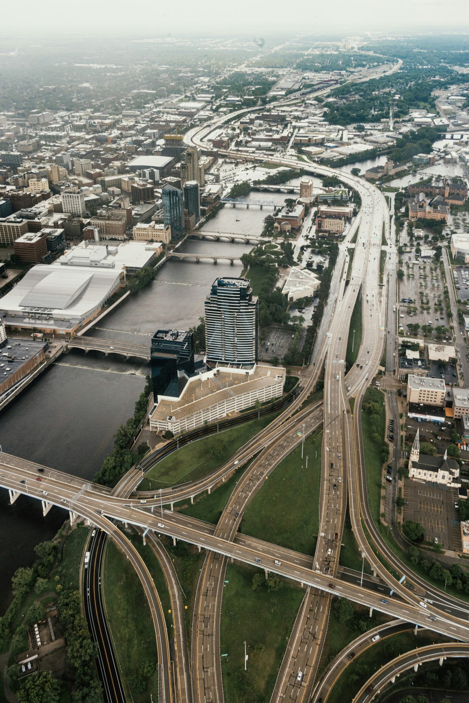 an aerial view of a highway intersection in a city